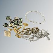 A collection of costume jewellery, cufflinks,