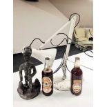 An anglepoise table lamp together with two bottles of Newcastle Brown ale 'Golden Jubilee' and a