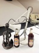 An anglepoise table lamp together with two bottles of Newcastle Brown ale 'Golden Jubilee' and a