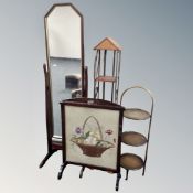 A cheval mirror on stand in mahogany finish together with fire screen, three tier metal cake stand,