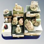 A tray of eleven Lilliput Lane ornaments, boxed.