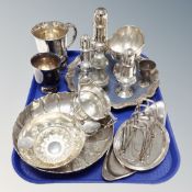 A tray of plated wares, pepper pots, wine tasters,