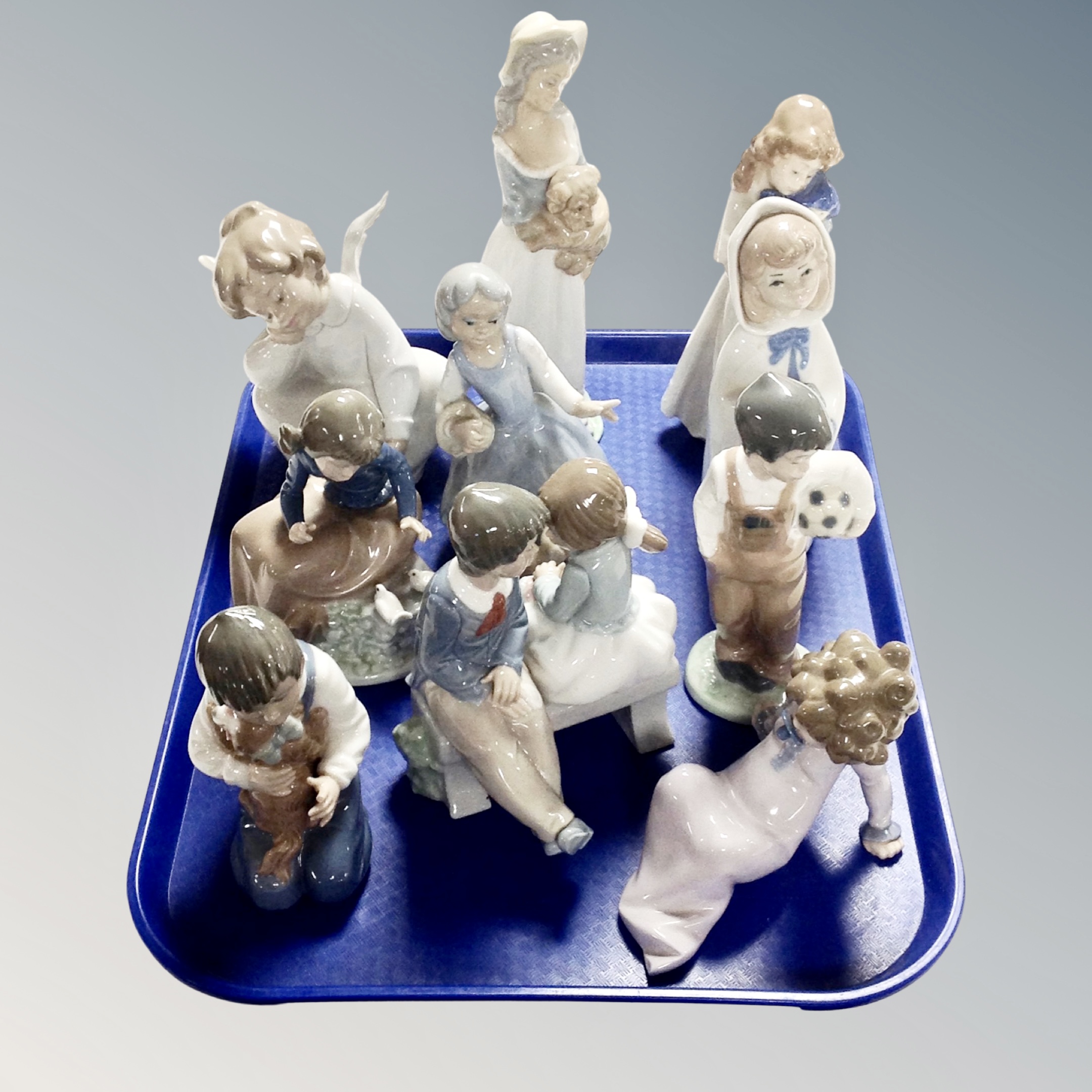 A tray of ten assorted Spanish figures,