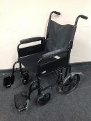 A Lomax folding wheel chair