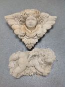 A concrete cherub wall pocket together with a cherub ornament