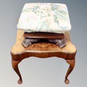 A Victorian footstool on carved scroll feet together with a shaped 20th century walnut table
