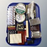 A tray of smoking related items, cigar and cigarette cases, tobacco cases,