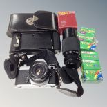 A tray of Nikon camera with lenses, Brownie camera in leather case,