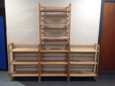 Four sets of folding stacking bookshelves