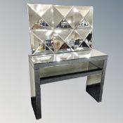 An all glass two tier console table together with further all glass sectional bevelled mirror