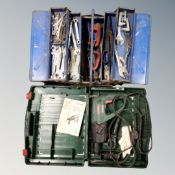 A metal concertina tool box containing hand tools,