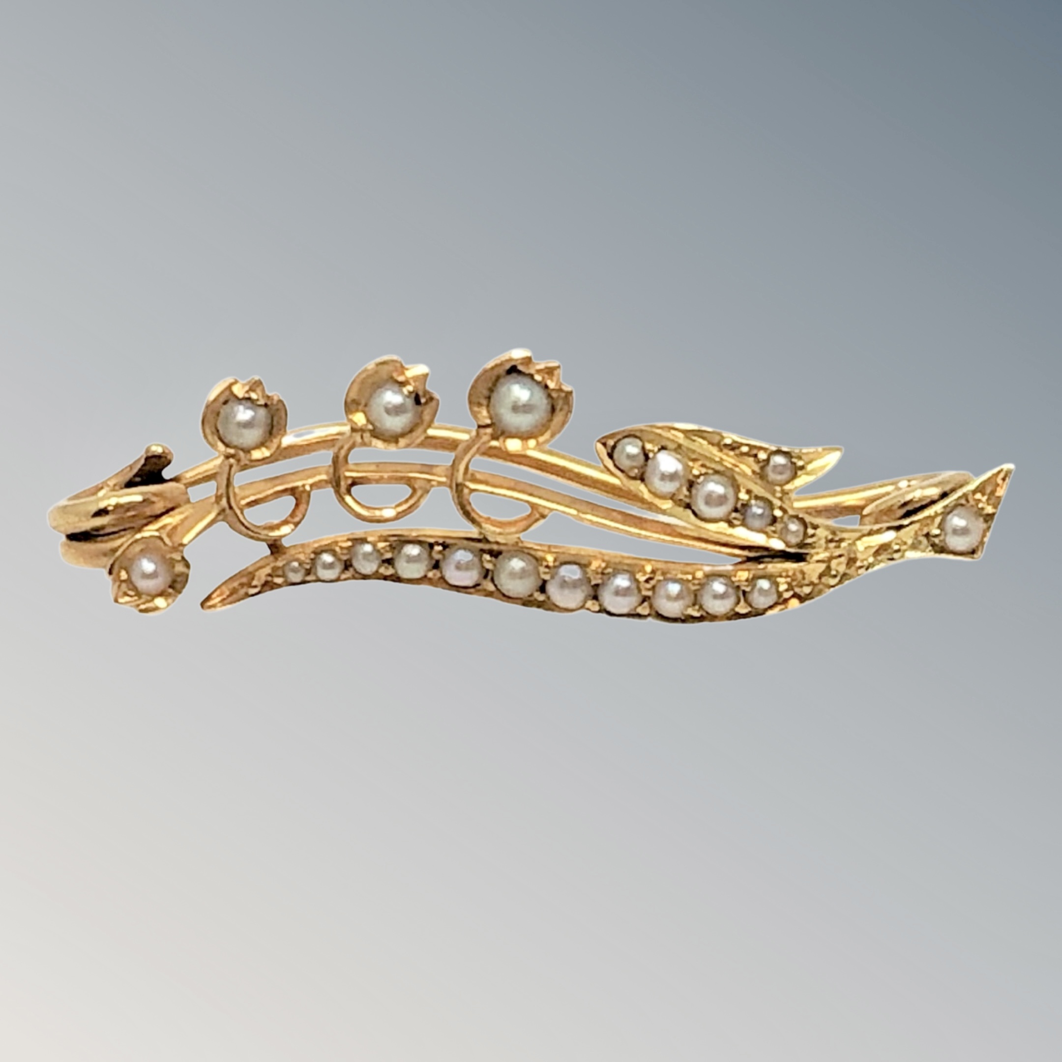 A gold seed pearl bar brooch CONDITION REPORT: Apparently unmarked. 2.