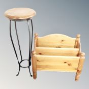 A Ducal pine plant stand on metal legs together with pine magazine rack
