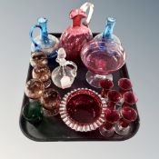 A tray of antique and later coloured glass ware,