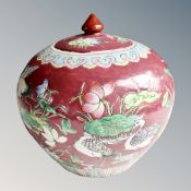 A Chinese lidded pumpkin vase decorated with storks