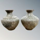 A pair of 19th century Indian bidri ware bulbous vases, height 12cm.