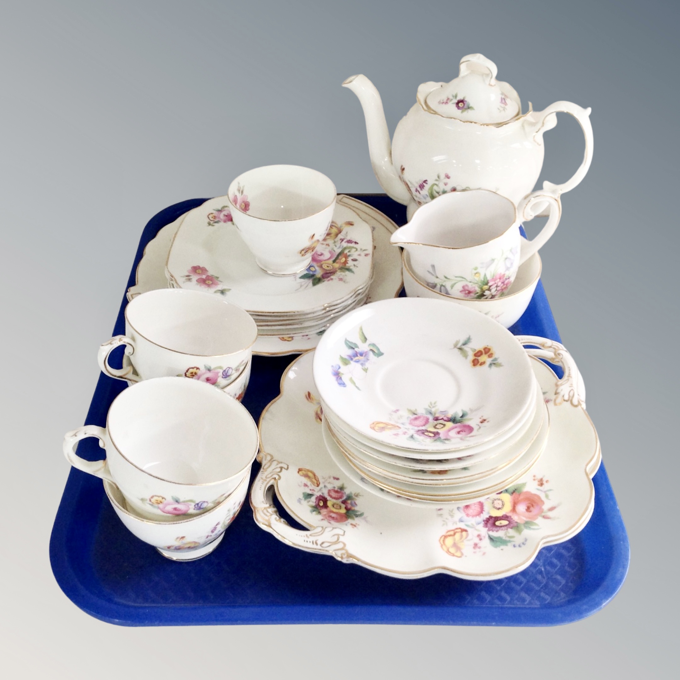 A tray of twenty-four pieces of Crescent Junetime tea china