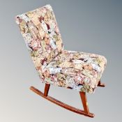 A 20th century rocking chair in cat fabric