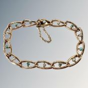 A 9ct gold turquoise set bracelet