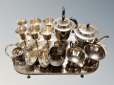A plated twin handled serving tray together with further plates wares,