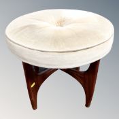 A 1970's teak G-Plan circular dressing table stool