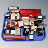 A tray of costume jewellery, silver pendants, cuff links,