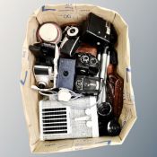 A box of vintage cameras and camera equipment