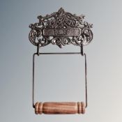 A Victorian style railway toilet roll holder