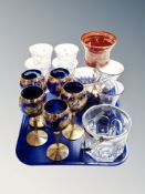A tray of Murano blue glass wine glasses together with red glass gilded goblet,