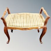 A French beech wood upholstered dressing table stool
