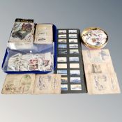 A tray of vintage cigarette card albums with cigarette cards, loose cards, tin of stamps,