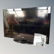 A Hitachi 46" LCD TV with remote