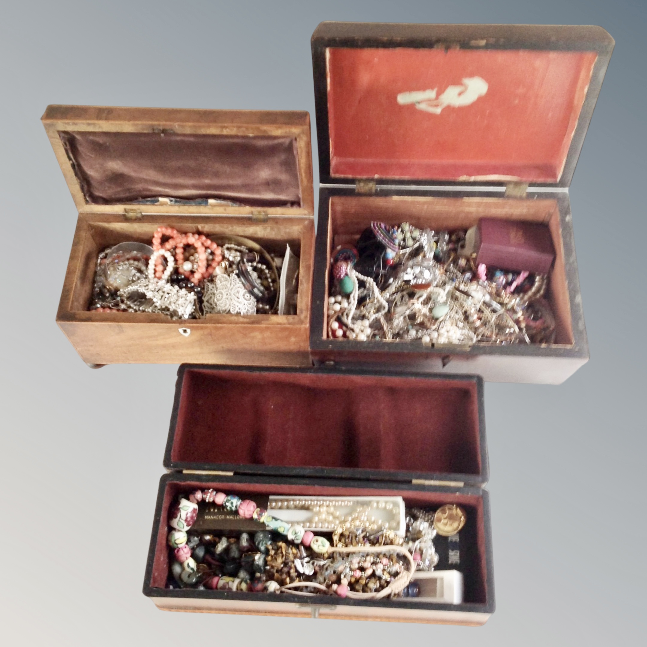 Three antique and later jewellery boxes and contents