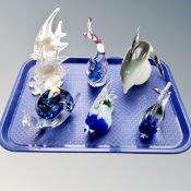 A tray containing six glass animal ornaments