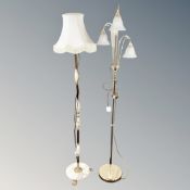 A gilt and onyx standard lamp with shade together with three-way floor lamp