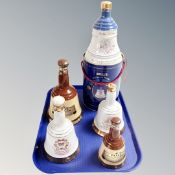 A tray of Bells whisky decanters, 90th Birthday of the Queen Mother 75cl in tin,