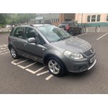 Suzuki SX4 SZ4 five door hatchback, registration WU60 MJK, first registered 17.11.