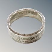 A silver Victorian two shilling piece band ring