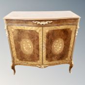 A Versailles Period High Fidelity double door serpentine fronted cabinet with gilt metal mounts