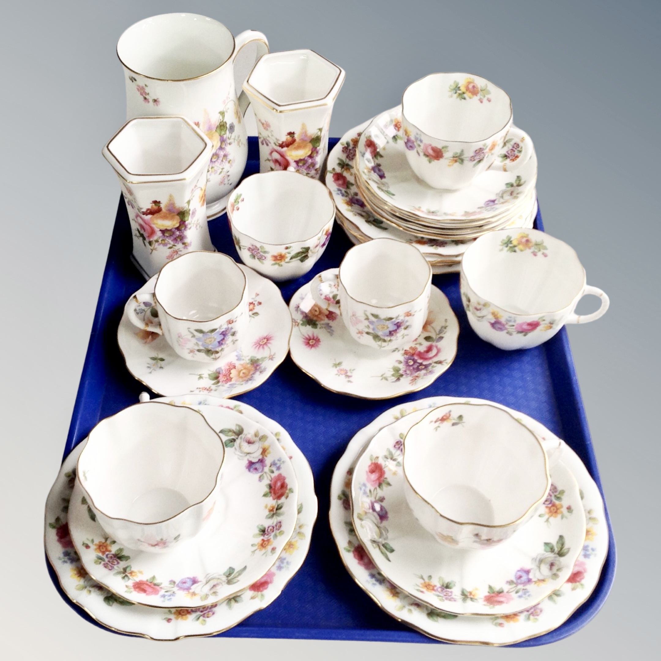 A tray of twenty three pieces of Royal Crown Derby Posies bone tea china together with pair of