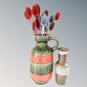 A 1970's West German vase with handle, height 40cm, containing dried flowers,