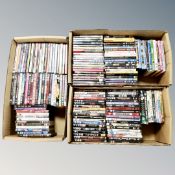 Three boxes of approximately 150 DVD's