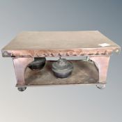 An Arts & Crafts two-tier food warmer with burners