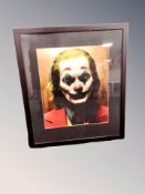 A colour print of Joaquin Phoenix as The Joker,