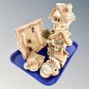 A tray of two Pendelfin house ornaments together with a further framed display event 96 figure,