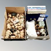 Two boxes of miscellany to include assorted metal ware, pig ornaments,