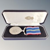 A Royal British Legion National Service Medal and ribbon in case