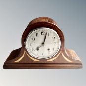 A late Victorian inlaid mahogany mantel clock with silvered dial