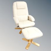 A swivel relaxer chair with footstool in cream leather