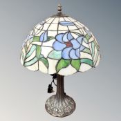 A Tiffany style table lamp with leaded glass shade